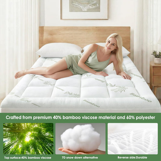 Cooling pillow top mattress topper on a bed