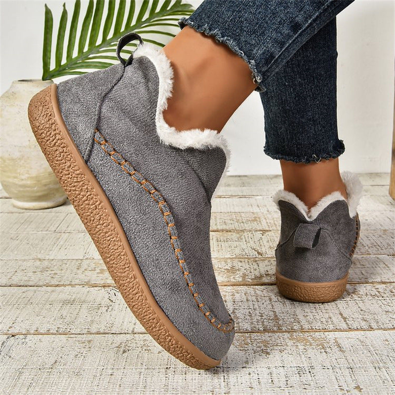 Fleece-lined slip-on ankle booties, side view