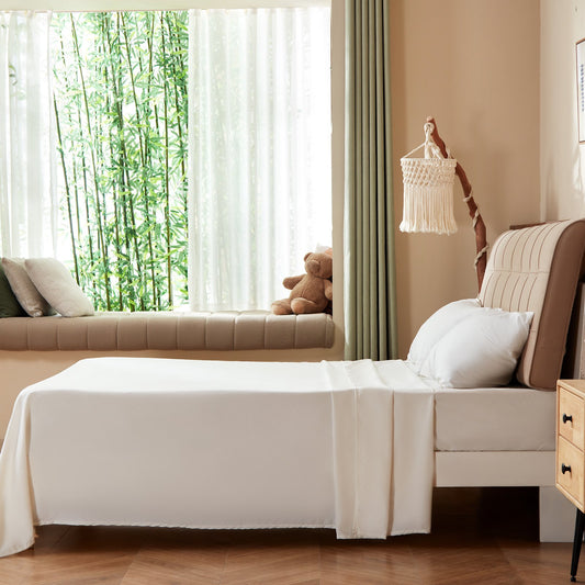 White bamboo fiber queen sheet set on a bed