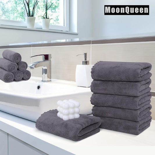 Gray coral velvet hand towels, 6 pack, in a bathroom