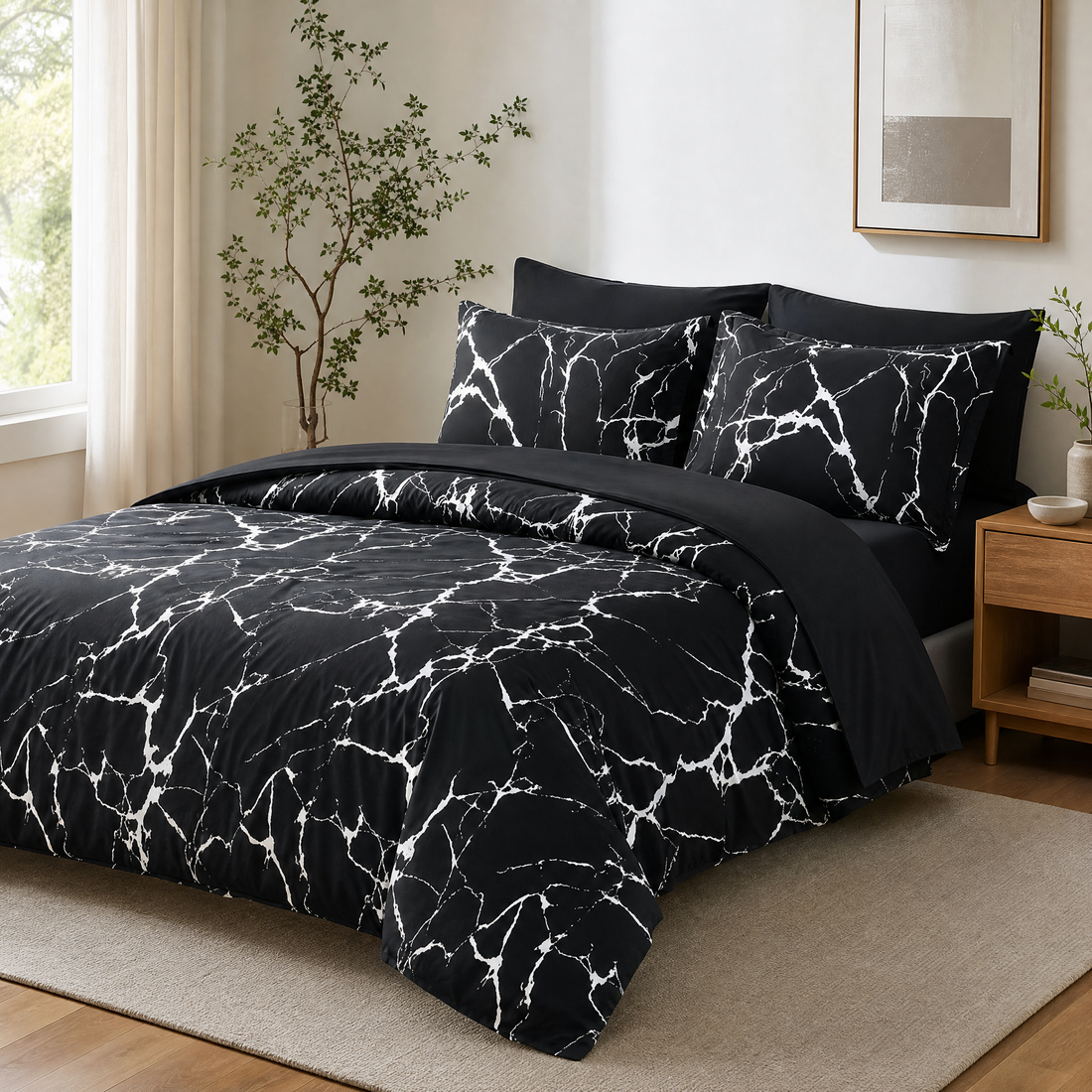 Black and white marble print king duvet cover set with 2 pillowcases on a made bed in a bright bedroom