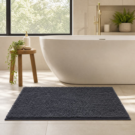 Charcoal gray chenille bath mat in a bright bathroom